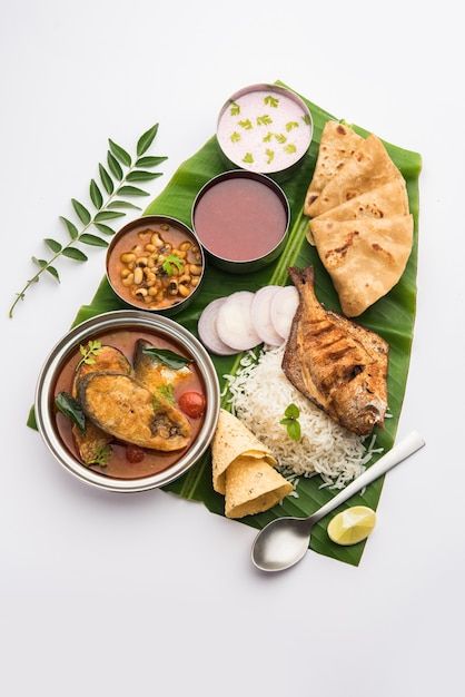 Indian fish platter or thali - popular s... | Premium Photo #Freepik #photo #curry-rice #gravy #rice-food #fish-curry Fish Thali, Food Posters, Rice Food, Food Fish, Fish Platter, Curry Rice, Sport Poster Design, Fish Plate, Vegetarian Meal