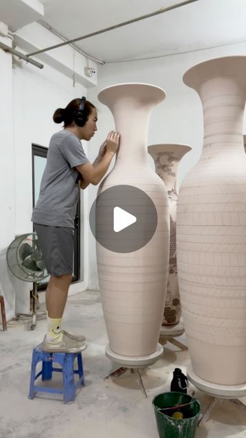 Micah Lewis-Văn Sweezie on Instagram: "it’s wild to work on a vase that’s taller than you  while studying in Bát Tràng, I had the amazing opportunity to decorate some large vases - this is the largest scale I’ve ever worked at. this project would not have been possible if it weren’t for all the amazing artisans who helped me the whole way. it was truly beautiful to work alongside these skilled artists and to witness the breadth of collaborative production within the ceramic process. more documentation to come…  #clay #ceramic #ceramics #pottery #art #craft #ceramicart #clayart #porcelain #handmade #vase #tire #battrang" Big Ceramic Vase, Big Ceramics Projects, Porcelain Handmade, Large Vases, Large Ceramic Vase, Handmade Vase, Ceramics Pottery Art, Big Art, Ceramics Pottery