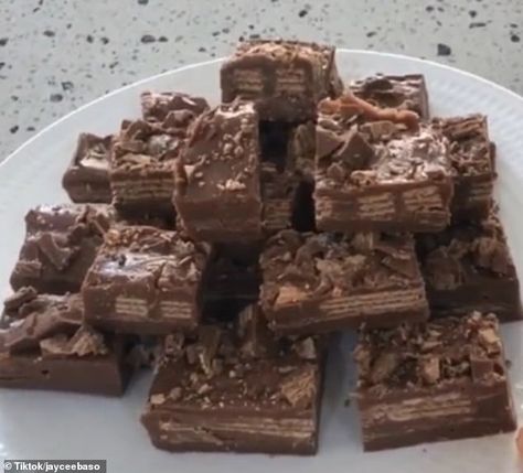 TikTok woman Jaycee Baso shares simple three-ingredient recipe for KitKat fudge slice | Daily Mail Online Kitkat Fudge Recipe, Kit Kat Fudge, Kitkat Fudge, Fudge Slice, Three Ingredient Recipes, Three Ingredient, Fudge Recipes, Daily Mail, Ingredients Recipes