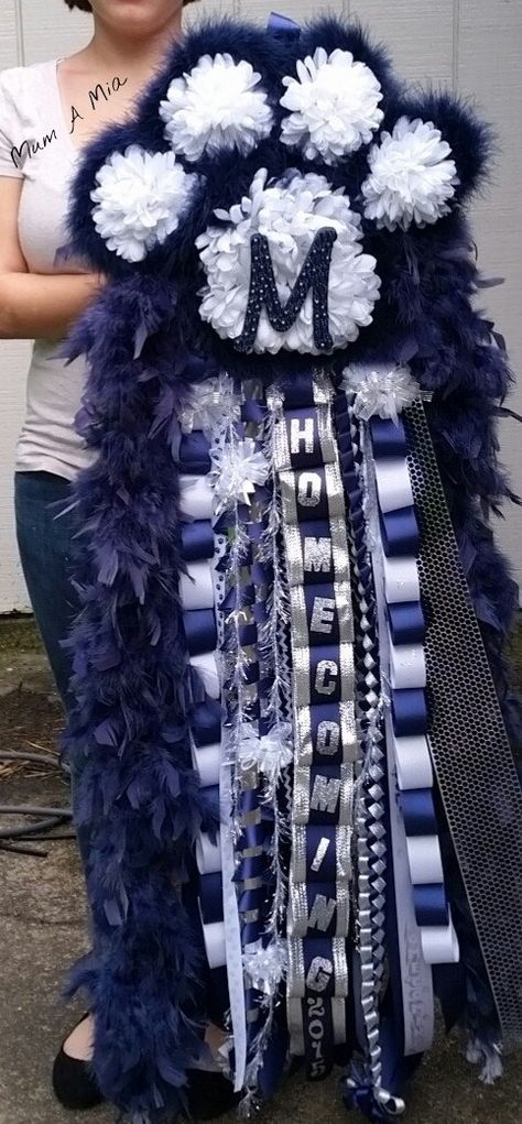 Mum A Mia is home to the original paw print homecoming mum. Let me create this unique design for you. Custom orders welcome. Texas Mums, Homecoming Mums Senior, Homecoming Corsage, Football Mums, Texas Homecoming Mums, White Mums, Homecoming Garter, Homecoming Spirit, Mums The Word