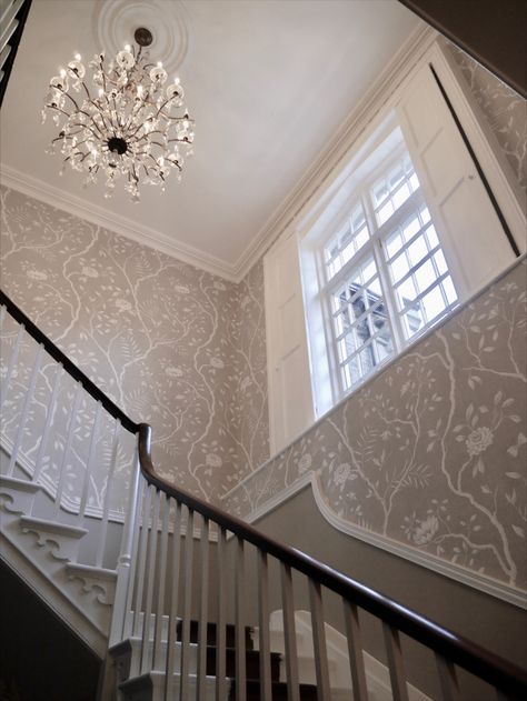 Lewis and Wood Jasper Peony wallpaper transforming this dark entrance hall. Narrow Stairway Wallpaper, Wallpaper With White Walls, Entrance Way Wallpaper, Wallpaper Up Stairs, Panelled Hallway With Wallpaper, Wallpaper In Stairway, Stairwell Wallpaper Ideas, Stairway Wallpaper Ideas, Stairs Wallpaper Ideas