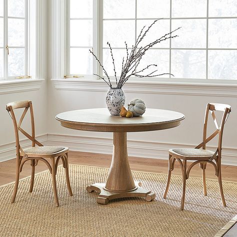 Round pedestal dining table