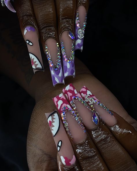 These so fire😍💜🩷 I had to post again🦍🔥 Inspo; @_nailsbyjoana . . . Dm to book!💖 @nailed.byjennie #longnails #pinknails #purplenails #blingnails #frenchnails #bapenails #bape #nailart #nailsnailsnails #nailsofinstagram #fresnonails #fresnonailtech #explorepage Practice Nail Designs, Pink Bape Nails, Bape Nails Design, Bape Nails Acrylic, Black And White Christmas Nails, Hood Nails, Bape Nails, Types Of Nails Shapes, Extra Nails