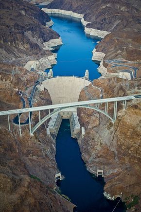 Hoover Dam....awesome picture with the new bridge...cannot believe how much the lake has dropped, you can tell by the white along the sides of the stone/rocks. Hoover Dam Bridge, Water Dam, Las Vegas Vacation, Bridge Over Troubled Water, Hoover Dam, Civil Engineering, Travel Usa, Nevada, The White