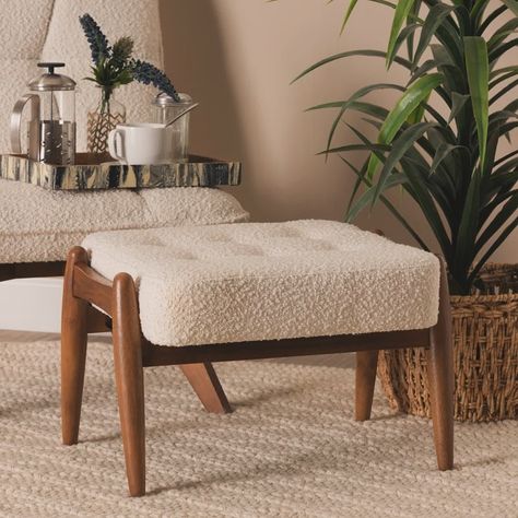 Unwind in style with our plush footstool that adds a touch of comfort and warmth to any space. Perfect for cozy corners, this piece invites relaxation with its soft fabric and mid-century modern design. 🌿✨ Where would you place this in your home? #CozyLiving #HomeDecor #NestHaven #RelaxInStyle Affordable Dining Room Sets, Walnut Stools, Tufted Design, Tufted Ottoman, Fabric Ottoman, Baxton Studio, Ottoman Footstool, Boucle Fabric, Upholstered Ottoman