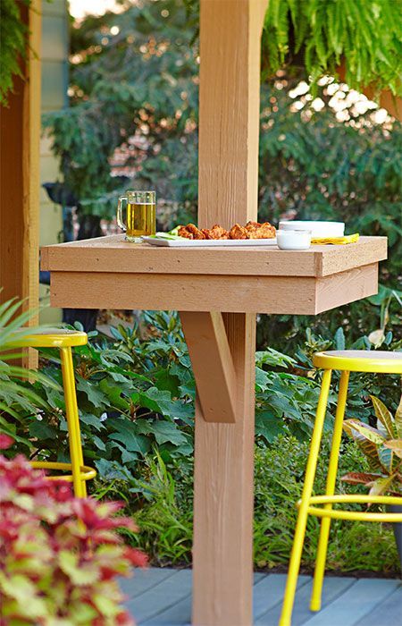 Add dining space for large groups by attaching tables to deck supports posts. --Lowe’s Creative Ideas Letnja Kuhinja, Cozy Pergola, Firepit Furniture, Backyard Apartment, Pallets Outdoor, Decorating Porch, Patio Ideas On A Budget, Veranda Design, Concrete Patios