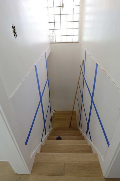 How To Do Board And Batten On A Staircase - A Beautiful Mess Stairway Board And Batten, Small Stairwell, Stairwell Wall Ideas, To Do Board, Basement Stairway, Batten Diy, Wainscoting Staircase, Stairway Wall, Stairwell Wall