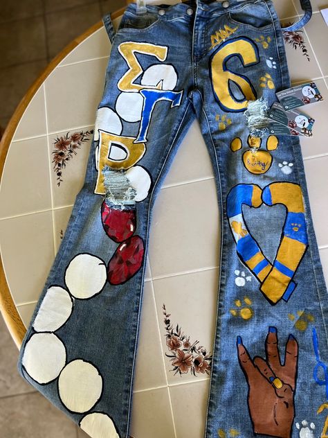 Greek jeans
Customized jeans
Painted jeans 
Sgrho
Pretty Poodle
1922 Sigma Gamma Rho Paraphernalia, Sigma Gamma Rho Outfits, Painted Outfits, Big Poodle, Sgrho Paraphernalia, Rho Gamma, Sigma Gamma Rho Sorority, Sorority Banner, College Graduation Photoshoot