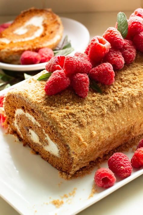 Honey Cake Roll just like "Medovik" only way easier! This fluffy sponge cake is incredibly simple to make, filled with a sour cream frosting, its sure to be a crowd-pleaser dessert and perfect for busy moms. Honey Roll Cake, Medovik Recipe, Honey Cake Recipe Easy, Medovik Cake, Ukrainian Desserts, Fluffy Sponge Cake, Honey Jelly, Russian Honey Cake, Sponge Cake Roll