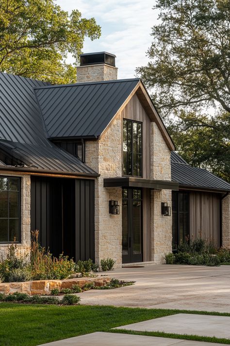 Discover 20 Modern Farmhouse Exteriors That Will Wow You - Country Modern Home Exterior, House With Grey Metal Roof, One Story Modern Farmhouse Exterior, Modern Farmhouse With Stone, Modern Farmhouse Designs, Modern Farmhouse Exteriors, Modern Rustic Exterior House, Industrial Farmhouse Exterior, Rambler Exterior