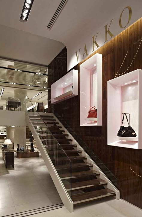 Vakko Nisantasi Store by Autoban, Istanbul Bags Shop Interior Design, Stair Wall Design, Clothes Shop Design, Showroom Lighting, Commercial Stairs, Fancy Store, Retail Display Cases, Jewelry Store Interior, Retail Store Interior Design