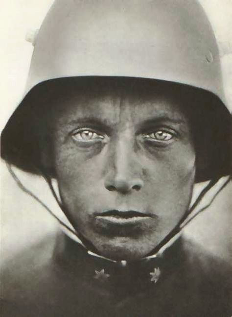 Austrian-Hungarian soldier, 1918. "It looks like a thousand yard stare, it’s like there’s nothing there. The rank insignia indicates that he is Austrian-Hungarian soldier, not German, he’s a lance corporal. In case you’re wondering, those lugs on the side of his Stahlhelm helmet were combination air vents and mounting lugs for an extra armor plate for nervous soldiers."  More information about the Stahlhelm helmet at link. Thousand Yard Stare, Lance Corporal, Rare Historical Photos, Shell Shock, The Great, Vintage Portrait, Nagasaki, Hiroshima, Military History