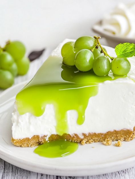 Green Grape Cheesecake 🍇

🍇 𝗜𝗻𝗴𝗿𝗲𝗱𝗶𝗲𝗻𝘁𝘀 🍇
For the Crust:
200g (about 2 cups) of graham cracker crumbs 🍪
100g (about ½ cup) of unsalted butter, melted 🧈
2 tablespoons of granulated sugar (optional) 🍬
For the Cheesecake Filling:
500g (about 2 cups) of cream cheese, softened 🧀
200ml (about ¾ cup) of heavy cream or double cream 🥛
150g (about ¾ cup) of granulated sugar 🍬
2 large eggs 🥚
2 tablespoons of cornstarch (to help stabilize the cheesecake) 🌽 Grape Cheesecake, Cheesecake Ingredients, Green Grape, Double Cream, Cheesecake Filling, Green Grapes, Graham Cracker Crumbs, Graham Cracker, Granulated Sugar