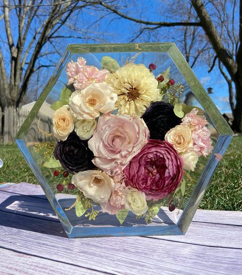 A beautiful 10” hexagon, letter, and ring holders 💗 bride- Brooke florist/planner- @hedoniaflowers 📍IL #floral #flowerpreservation #bouquet #bride #weddinggift #resinart #satisfying #weddinginspo #bouquetpreservation #driedflowers #bridetobe #groomtobe #engagement #preservedflower #weddingideas #handmade #weddingbouquet #flowerart Wedding Bouquet In Resin, Bouquet In Resin, Large Wedding Bouquet, Bridal Bouquet Preservation, Kids Candles, Flowers Resin, Wedding Bouquet Preservation, Floral Preservation, Flower Preservation