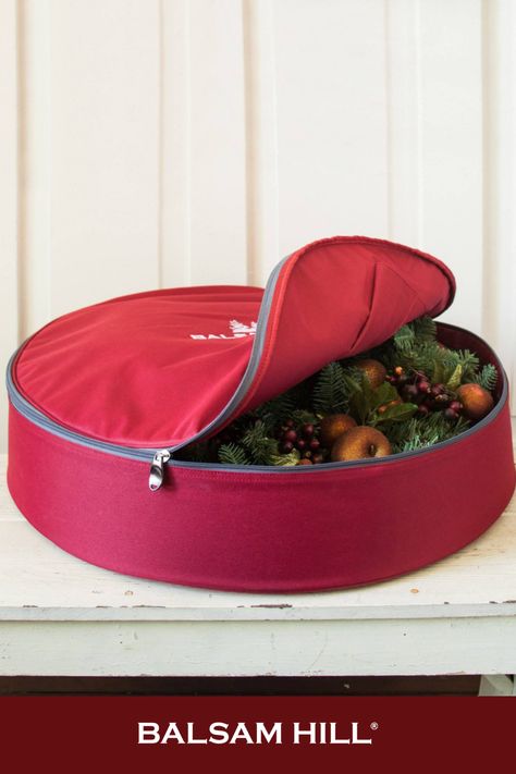 Keep your wreaths in lovely shape and looking great season after season with sturdy storage bags. These wreath storage bags feature an inner hanger and curved carrying handle to keep foliage in a stable upright position. #BalsamHillUK #ChristmasDecor #ChristmasTree #ChristmasIdeas #ChristmasStocking #ChristmasDesign #HomeDecor #Interior #InteriorDesign #Home #Design #Fall #Autumn #Inspiration #Wreath #Garland #UK #Ireland Christmas Tree Tote, Christmas Tree Storage Bag, Ornament Storage Box, Wreath Storage, Slim Tree, Christmas Tree Storage, Artificial Christmas Wreaths, Red Wreath, Ornament Storage