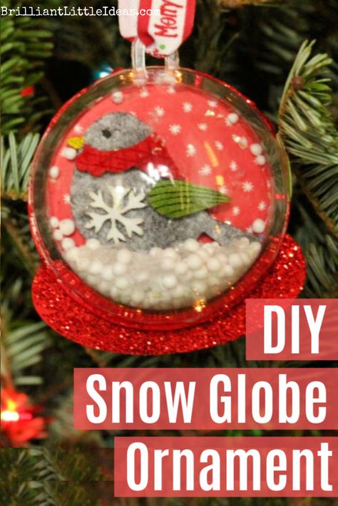 Try this DIY Christmas Ornament for kids to make. Your kids can give them to family as homemade Christmas gifts! DIY Snow Globe Ornament with video for ease. #christmas #christmasdecor Snowglobe Ornament With Picture, Diy Snowglobe, Snowglobe Christmas, Homemade Snow Globes, Snow Globe Ornament, Christmas Scrapbook Paper, Globe Crafts, Diy Snow, Diy Snow Globe