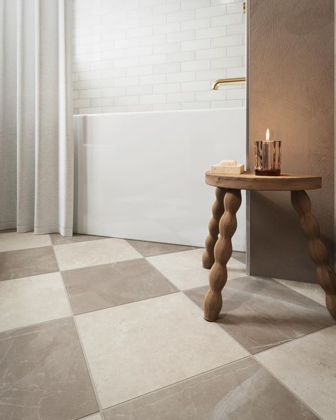 Step into timeless charm with this beautiful bathroom design by @edward.martin! Featuring classic checkered floors, a soft neutral palette, and brass accents, this space strikes the perfect balance between modern elegance and vintage warmth. The arched shower frame and natural textures add a touch of serenity, making it a true sanctuary ✨ Discover more luxurious inspiration through the link in bio ☝🏻 Get the best interiors 👉 @homes_society #maisonvalentina #luxurybathroom #dreambathroom #... Diamond Tile Floor, Checkered Floor Kitchen, Brown Tile Bathroom, New Build House, White Bathroom Tiles, Laundry Room Flooring, Matte Porcelain Tile, Square Tiles, Classic Tile