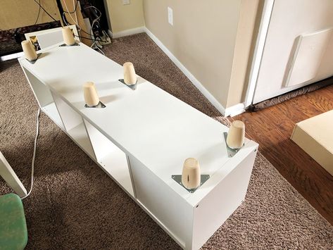 How To Put Legs On Cube Storage, Adding Legs To Bookshelf, How To Add Legs To Cube Storage, Cube Shelf Hack, Kallax Sofa Table, Adding Feet To Cube Storage, Kallax Feet Hack, Cube Storage With Legs Diy, Add Legs To Cube Shelf