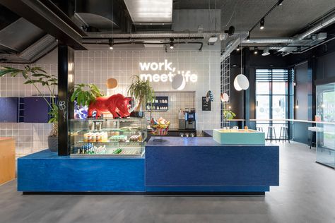 TSH Collab by Ninetynine | Office facilities Student Hotels, Coworking Space Design, Food Counter, Office Blue, Upholstered Walls, Wall Niche, Long Walls, Wooden Sheds, Counter Design