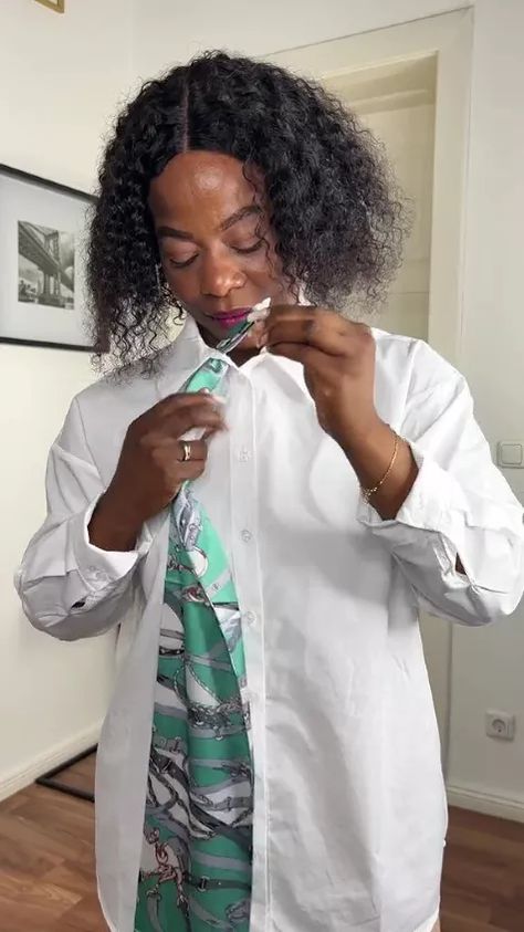 Here’s a scarf hack to lift your plain button down shirt into a different class. Learn an easy scarf trick in this quick post. Scarf With White Button Down Shirt, How To Wear A Scarf With A Collar Shirt, Scarf With Collared Shirt, Scarf Tying Tutorial, Short Scarves, Button Scarf, Shirt Hacks, Scarf Tutorial, Long Silk Scarf