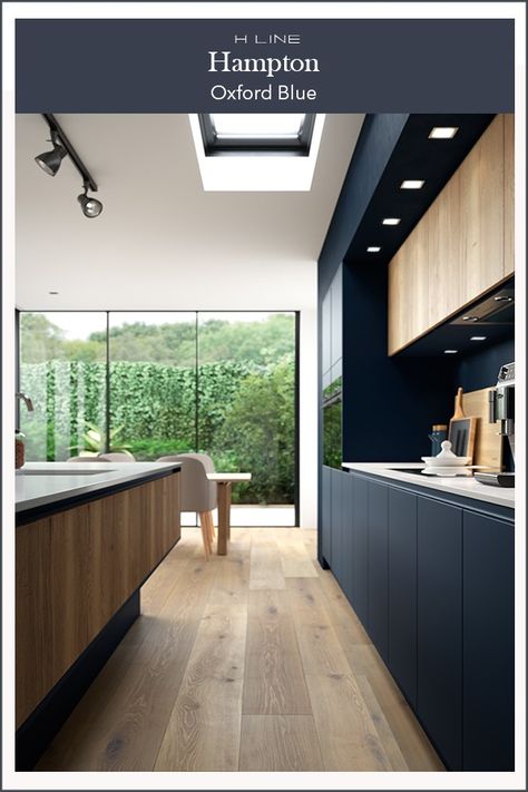 Dark kitchens are all about the drama and this dark blue combination with a wood effect textured finish is the epitome of modern kitchen design. Masterclass Kitchens distribute kitchens across to independent retailers across England, Wales and Scotland Dark Blue Kitchen, Kitchen Cabinets And Flooring, Dark Blue Kitchens, Modern Black Kitchen, Navy Kitchen, Barn Kitchen, Handleless Kitchen, Blue Kitchen Cabinets, Textured Wood