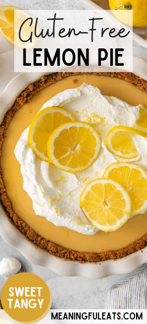 A whole lemon pie with graham cracker crust topped with whipped cream, lemon slices, and lemon zest. Gf Lemon Meringue Pie, Gluten Free Lemon Pie Recipe, Gluten Free Lemon Pie, Gluten And Dairy Free Pie, Gluten Free Lemon Meringue Pie, Gluten Free Lemon Recipes, Gluten Free Pie Recipes, Gluten Free Pies, Gluten Free Lemon Meringue Pie Recipe