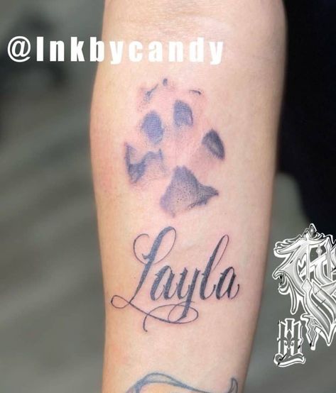 Dog Paw Tattoo With A Name of Layla Layla Tattoo, Paw Tattoo Ideas, Paw Print Tattoo Dog, Dog Paw Print Tattoo, Dog Memorial Tattoos, Pawprint Tattoo, Dog Paw Tattoo, Saved Tattoo, Tattoo Meanings