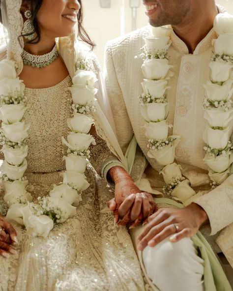 It’s in the small details Photography: @ngcreativestudio Venue: @atholhallvenue Makeup: @myuraaroraofficial Bridal outfit: @ananya_by_abhishekh Decor: @jddecor_ Bouquet and florals: @theshaadiproject_ Henna: @hennabymaziah Hindu Flower Garland, White Flowers Engagement Decor, Hindu Garlands Wedding, Wedding Flower Mala, Engagement Malai Design, White Varmala, Garlands For Engagement, Hand Gajra, Henna Photography