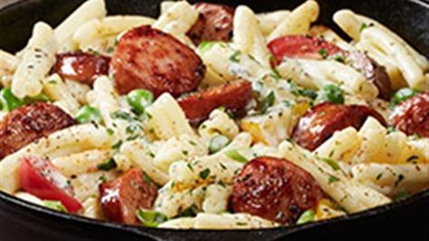 This creamy pasta and sausage dinner gets some heat from Cajun seasoning, and it's ready to serve in 15 minutes. Sausage Alfredo Pasta, Sausage And Vegetables, Sausage Alfredo, Pasta Sausage, Smoked Sausage Recipes, Sausage Dinner, Alfredo Recipe, Smoked Sausage, Sausage Recipes