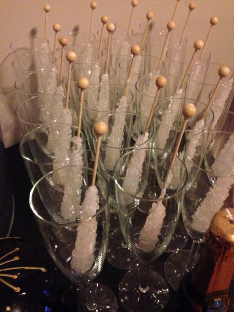 Rock candy in champagne flutes Rock Candy Champagne, Candy Centerpiece, Hawaiian Party Decorations, Magic Party, Winter Wonderland Baby Shower, Candy Drinks, Wedding 2025, Hawaiian Party, Wedding Color Palette