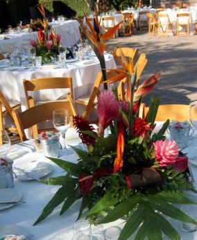 tropical centerpiece for round reception tables: birds of paradise, anthuriums, bromeliads, orchids, orange tiger lilies, monstera leaves Luau Centerpieces, Cuban Wedding, Wedding Table Deco, Wedding Centerpeices, Tropical Wedding Centerpieces, Tropical Centerpieces, Cheap Wedding Centerpieces, Tropical Wedding Inspiration, Exotic Wedding