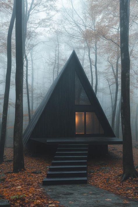 A-frame cabin nestled in a foggy autumn forest. Little cabins with less space can equal more joy, laughter, and maybe even a whole new perspective on what “downsizing” truly means. Frame Cabin Plans, Foggy Autumn, Dutch Braid Updo, A Frame Cabin Plans, Frame Cabins, Scandinavian House, Cabin Modern, Tiny Tree, A Frame Cabins