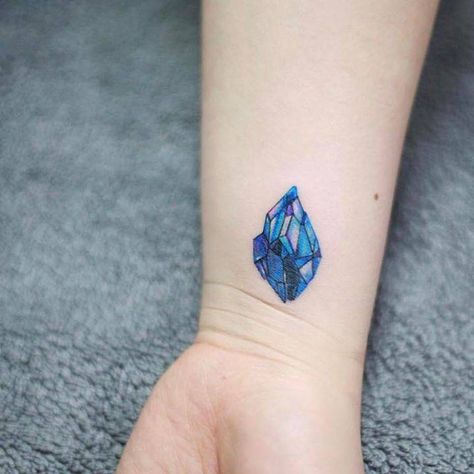 Sapphire tattoo on the inner wrist. Sapphire Tattoo, Diamond Tattoo Meaning, Bow Tattoo Designs, Diamond Tattoo, Gem Tattoo, Crystal Tattoo, Diamond Tattoos, Wrist Tattoos For Guys, Daisy Tattoo