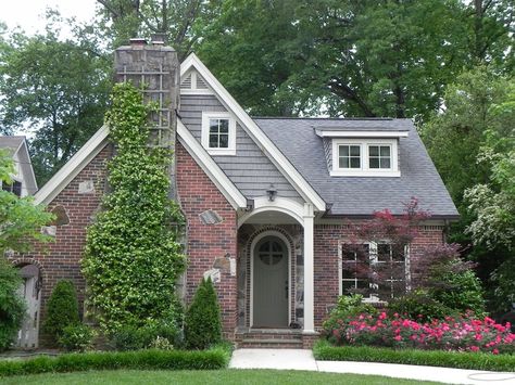 chimmney in the front | Cottage home. Rounded door. Chimney in front. Un Voyage Culinaire: Guy ... Chimney Front Of House, Brick Cottage Exterior, Rounded Door, 1930s Cottage, White Colonial, Brick Cottage, Tudor Cottage, Cottage Exteriors, Storybook Homes