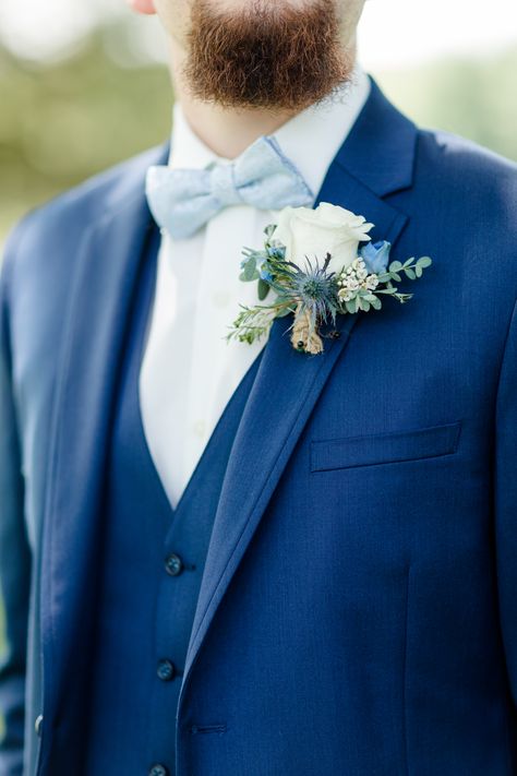 Dusty Blue & Navy Groom's Attire Navy Groom Tuxedo Wedding, Navy Blue Tux With Dusty Blue Tie, Navy Blue And Dusty Blue Groomsmen, Navy Suit With Dusty Blue Tie, Navy Suit With Blue Tie, Blue Suit With Bow Tie Wedding, Groom Suits For Wedding Blue, Dusty Blue Suit Groom, Navy Suit Blue Tie