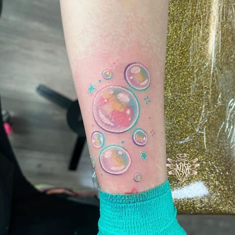 A bit angry but this was such a fun cute full color tattoo for @dreametri 💖💖🫧🫧 . . . Made @companiontattoo . . . #bubbles #colorbubbles #ka… | Instagram Real Glitter Tattoo Ideas, Fun Color Tattoos, Bubble Wand Tattoo, Water Bubbles Tattoo, Color Full Tattoo, Glitter Tattoos Real, Bubbles Tattoos, Tattoo Bubbles, Colorful Tattoo Sleeve