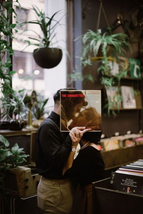 Record Store Engagement Photoshoot, Record Shop Photoshoot Men, Record Store Wedding Photos, Couple In Record Store, Thrift Store Engagement Photos, Antique Store Engagement Photos, Record Shop Engagement Photos, Record Store Engagement Photos, Library Photoshoot Ideas Couple