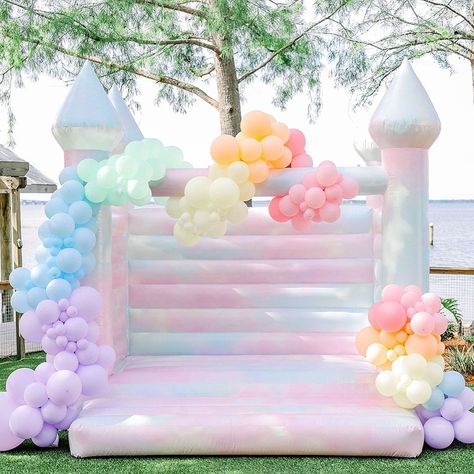 MINGLE 30A on Instagram: “We’re still dreaming about this tie-dye bouncer from @houseofbounce30a and…it’s aptly named “cotton candy” which makes it even more delish!…” Pastel Bouncy Castle, Fairy Bounce House, Cotton Candy Themed Party, Rainbow Bounce House, Tie Dye Balloon Decor, Pastel Bounce House, Unicorn Bounce House, Bounce House With Balloons, Cute Bounce House