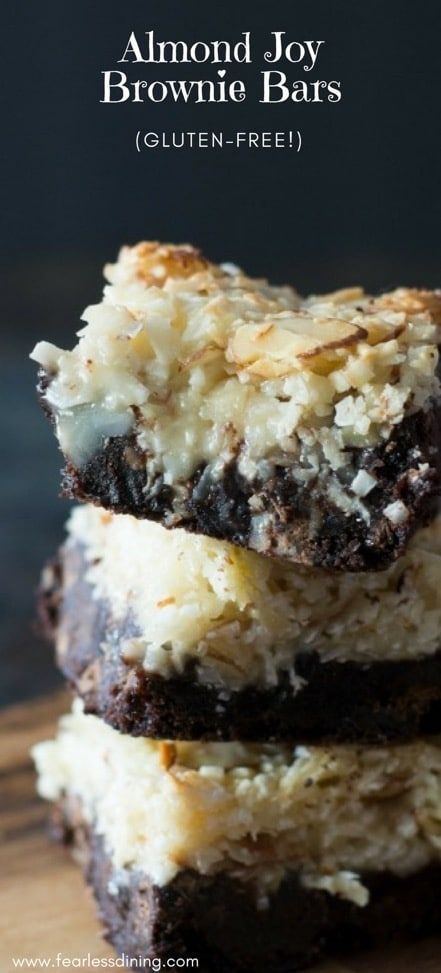 These gluten free chocolate coconut almond cookie bars taste like an almond joy! Gluten free brownie bottom topped with a gooey coconut topping and sliced almonds. Recipe at www.fearlessdining.com #almondjoybars #almondjoybrownies #glutenfreecookies #glutenfreealmondjoy Almond Cookie Bars, Almond Joy Brownies, Almond Brownies, Gluten Free Cookie Bars, Gluten Free Brownie, Best Gluten Free Cookies, Almond Joy Bars, Joy Cookies, Brownie Bars