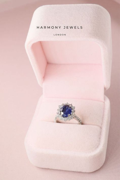 Check out this Oval Blue Sapphire in a Cluster Halo engagement ring with Micro set shoulders Diamond Ring With Sapphire Halo, Sapphire Halo Ring, Oval Halo Engagement Ring, Blue Sapphire Engagement Ring, Sapphire Engagement Ring Blue, Sapphire Engagement Ring, Sapphire Engagement, Halo Ring, Halo Rings