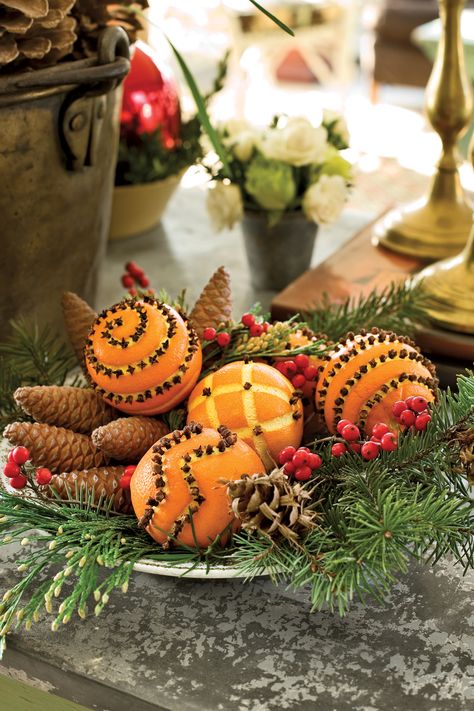 Aromatic Centerpiece  - CountryLiving.com                                                                                                                                                                                 More Natal Country, Natal Natural, Homemade Potpourri, Jul Diy, Pomander Balls, Simple Holiday Decor, Cones Crafts, Pine Cone Crafts, Natural Christmas