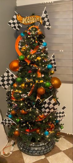 Junky Christmas Trees, Hot Wheels Tree Christmas, Little Boy Room Christmas Tree, Auto Shop Christmas Decorations, French Christmas Tree Ideas, Kid Tree Christmas, Monster Truck Christmas Tree Ideas, Kids Themed Christmas Tree Ideas, Cookie Monster Christmas Tree Ideas