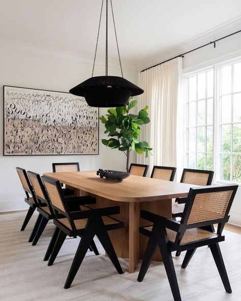 Allison Elefante on Instagram: "A room always needs to be functional first and foremost but when you have a designer on the job, they bring the wow factor and elevate it to another place! 🖤 design // @clarekennedyinteriors photo // @allisonelefantephoto" Black And Tan Dining Chairs, Dining Room With Rattan Chairs, 2024 Dining Table Trends, Masculine Dining Room, Rattan Dining Room, Miami House, Contemporary Loft, Apartment Goals, Minimalist Dining Room