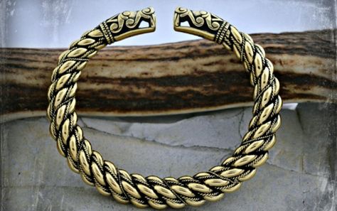 Extremely thick bronze Viking bracelet with large dragon head terminals- replica. http://www.thorkilshop.com/shop/4579371519/extremely-thick-bronze-viking-bracelet-with-large-dragon-head-terminals--replica-bdg3/10354775 Casted Jewelry, Viking Arm Rings, Large Dragon, Celtic Bracelet, Norse Jewelry, Mens Silver Jewelry, Bracelet Viking, Viking Pendant, Viking Bracelet