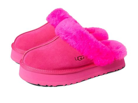 UGG Disquette - Women's Shoes : Taffy Pink : Elevate your comfort game with the UGG Disquette slipper. Premium construction and materials. Secure and comfortable fit. Slip on mule style. Open back. Cushioned footbed. Fur lined. Real, dyed fur from sheep originating from United States, UK, Spain, Ireland, Australia. Suede leather upper. Sheepskin collar, lining, and footbed. Synthetic outsole. Imported. Weight of footwear is based on a single item, not a pair. Pink Ugg Slippers, Cute Uggs, Pretty Sneakers, Pink Uggs, Preppy Shoes, Pretty Shoes Sneakers, Jordan Shoes Girls, Ugg Style, Shoes Ugg