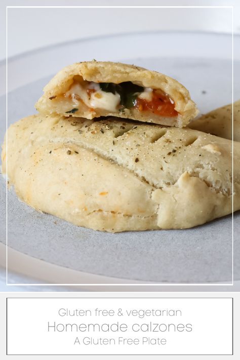 A gluten free calzone is cut in half. You can see marinara sauce, mozzarella cheese, and basil inside the calzone. Gluten Free Calzone Dough, Homemade Gluten Free Pizza Dough, Gluten Free Calzone, Homemade Calzone Recipe, Calzone Dough, Homemade Calzone, Gluten Free Pizza Dough, Pizza Calzone, Calzone Recipe