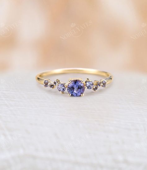 This is a perfect Anniversary gift, Wedding gift, Mothers Day gift, Birthday gift, Holiday gift or an I Love You gift!! - Delicate Tanzanite Engagement Ring - Conflict-free Natural Diamond - Comfortable Band About Ring ◎◎ All rings are handmade in the United States ◎◎ Metal: Solid 14K & 18K Gold ◎◎ Gold Color: Rose gold, Yellow gold, White gold ◎◎ Weight: about 1.23 g (may vary depending on the ring size) ◎◎ Shank: 1.2 mm(shank width) & 1.1 mm(shank thickness) About Stones ◎◎ Center Stone - Tanz Sapphire Wedding Rings Simple, Tanzanite And Sapphire Ring, Tanzanite Cluster Ring, Engagement Ring Tanzanite, Blue Topaz Engagement Ring Gold, Tanzanite Gold Ring, Unique Dainty Wedding Rings, Unconventional Engagement Rings Stones, Tanzanite Engagement Ring Gold