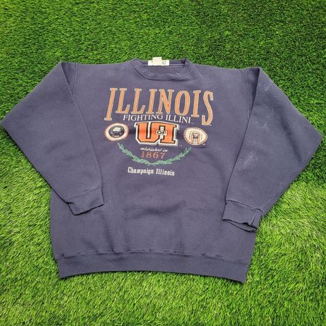 Vintage Illinois University apparel for sale! Represent your team in style with these nostalgic pieces 🏈🔶 Perfect for any season and a must-have for any Fighting Illini fan. #VintageFashion #Illinois #CollegeSpirit 🧡 Vintage College Sweatshirt, Vintage College Sweatshirts, University Apparel, College Gear, College Wear, Navy Blue Sweatshirt, College Apparel, Navy Sweatshirt, Lake Elsinore