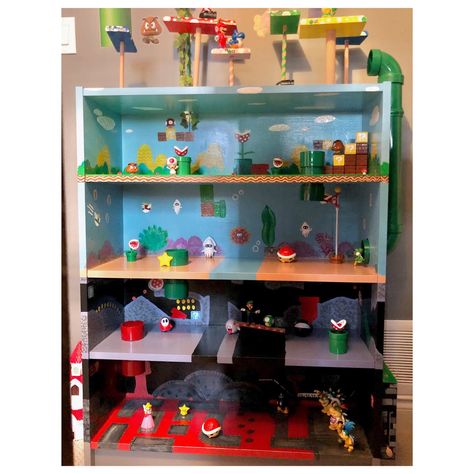 Super Mario Bookshelf, Super Mario Shelf, Diy Super Mario Dollhouse, Super Mario House Diy, Super Mario Lego Display Ideas, Mario Bookshelf, Super Mario Play House Diy, Mario House Diy, Mario Shelf