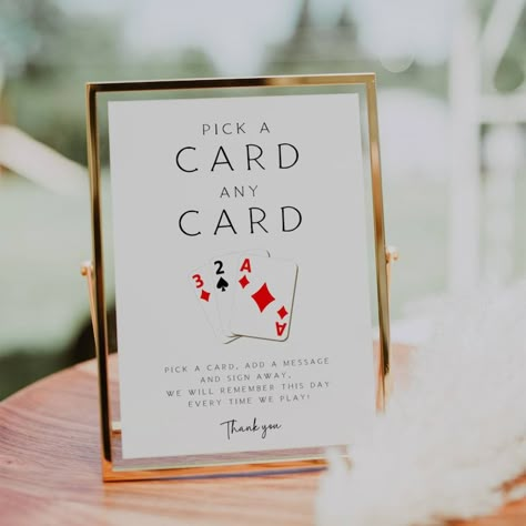 Welcome to our unique Pick a Card Guestbook Sign, the perfect addition to your special day! This custom playing card-inspired sign is a fun and creative way to invite your guests to leave their well wishes. With this instant download editable template, you can easily customize the sign to match your wedding theme. Encourage your loved ones to sign your guest book with this deck of cards sign that is sure to stand out. FLD069 Guest Book Decor, Card Guest Book, Cute Guest Book Ideas, Games Wedding Sign, Pick A Card Any Card Guest Book, Wedding Guestbook Sign, Wedding Book Signing Ideas, Wedding Playing Cards, Unique Guest Book Ideas